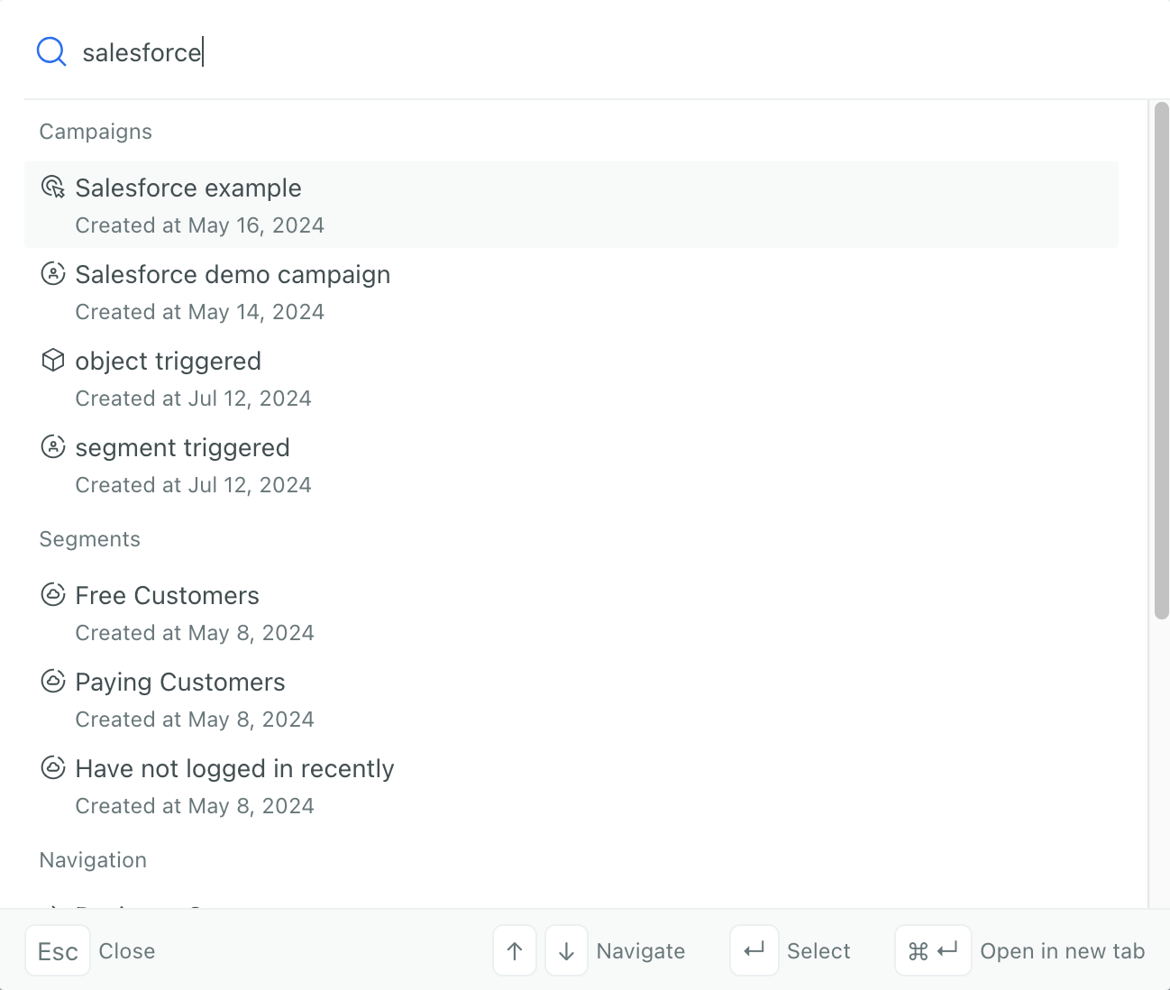 The universal search dialog showing search results for campaigns, segments, and templates.